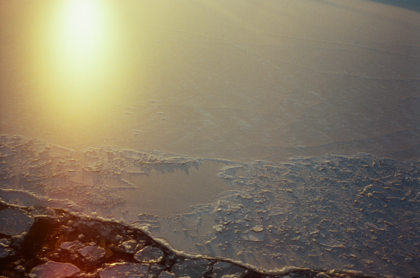 Sunrise reflected on the surfance of the ice sheet in the Stockholm archipelago. The navigation channel of the ship is shown at the bottom of the photo. Crossing Baltic sea from Helsinki, Finland on morning of Friday 20 February 2026. (Photo Ref: 235.457.5348/037)